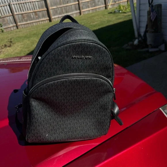 Two Michael Kors backpacks very good condition. Original tags with both bags!